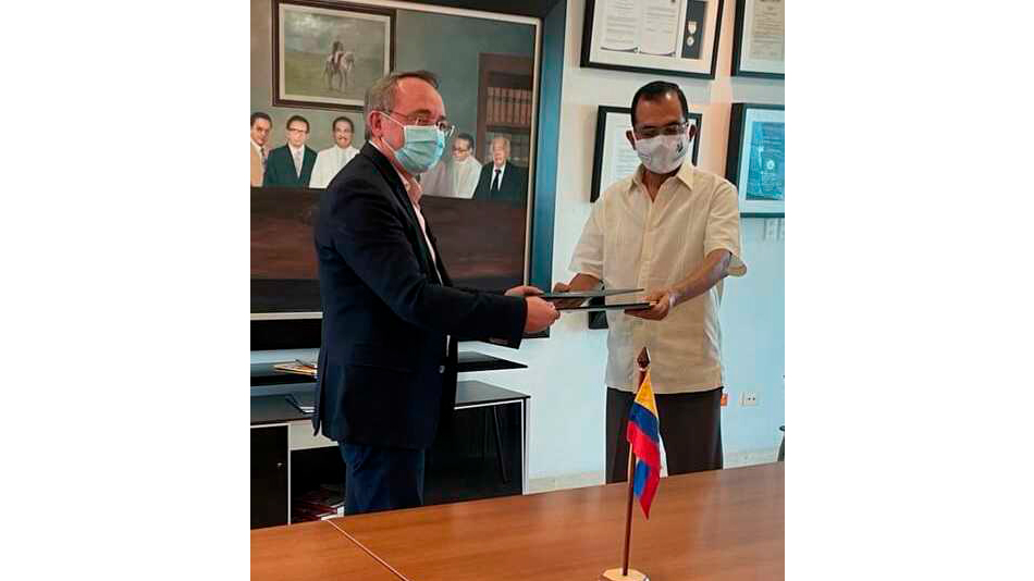 Manuel Herrera y José Consuegra, rector de la Universidad Simón Bolívar de Barranquilla.